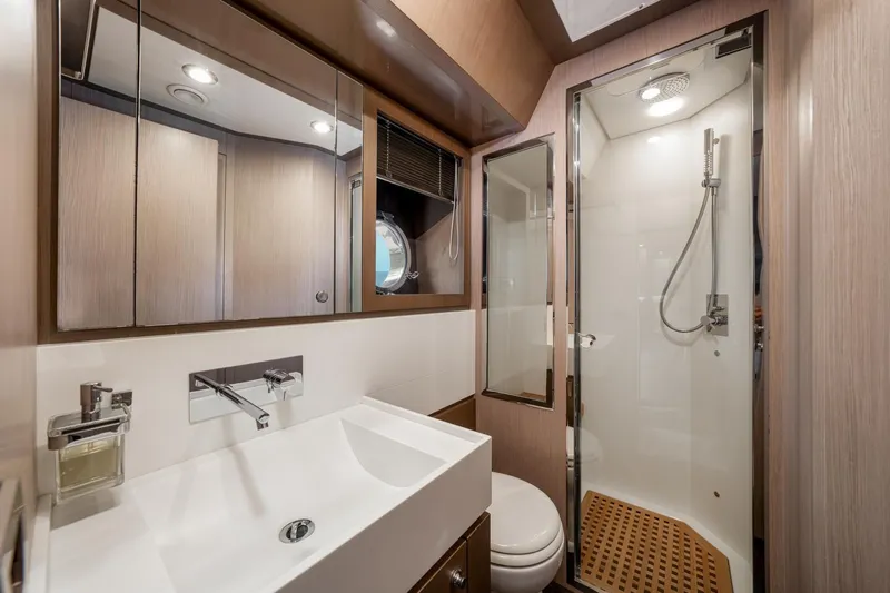 Da Rose Yacht Photos Pics Luxurious bathroom on 2012 Riva 86' DOMINO yacht with modern fixtures and shower.
