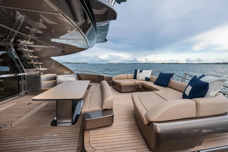 Da Rose Yacht Photos Pics Luxurious 2012 Riva 86' DOMINO yacht deck with elegant seating and ocean view.