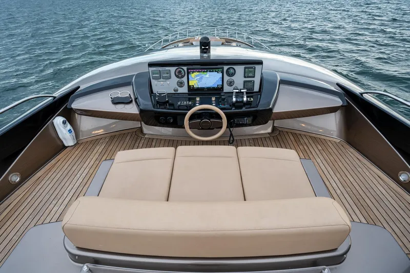 Da Rose Yacht Photos Pics Luxurious 2012 Riva 86' DOMINO yacht helm with modern navigation controls on open water.