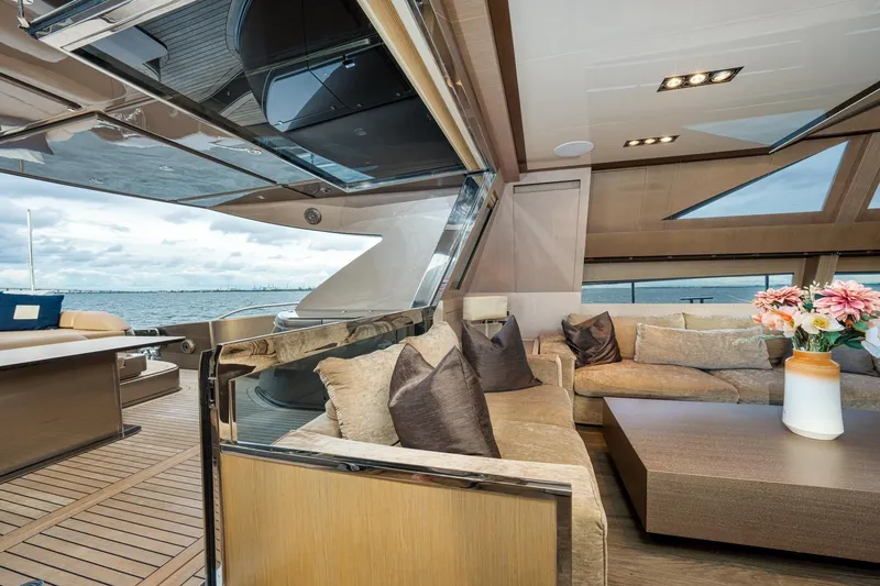 Da Rose Yacht Photos Pics Luxurious interior of 2012 Riva 86' DOMINO yacht with elegant seating and ocean view.