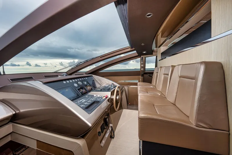 Da Rose Yacht Photos Pics Luxurious interior of 2012 Riva 86' DOMINO yacht with leather seating and modern dashboard.