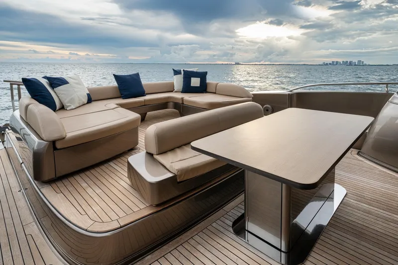 Da Rose Yacht Photos Pics Luxurious 2012 Riva 86' DOMINO yacht deck with elegant seating and ocean view.