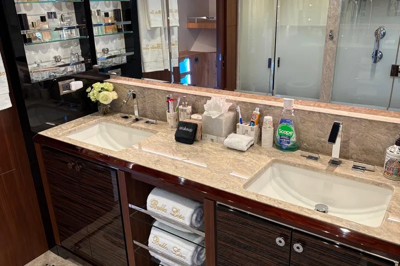 Bella Lisa Yacht Photos Pics Luxurious bathroom in 2020 Ocean Alexander 100 Skylounge Megayacht with dual sinks and elegant decor.