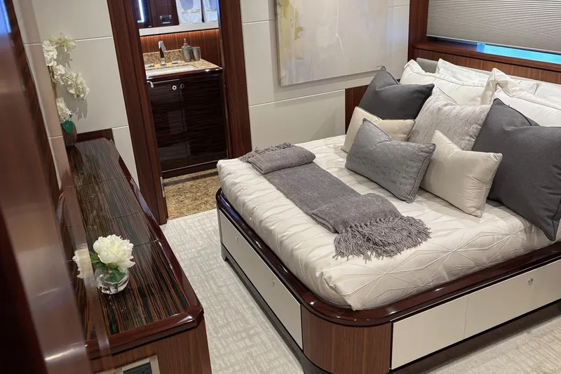 Bella Lisa Yacht Photos Pics Luxurious bedroom interior of 2020 Ocean Alexander 100 Skylounge Megayacht, featuring elegant decor.