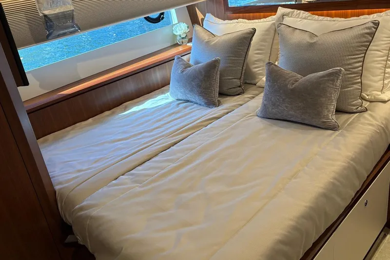 Bella Lisa Yacht Photos Pics Luxurious bedroom interior of 2020 Ocean Alexander 100 Skylounge Megayacht with elegant bedding.