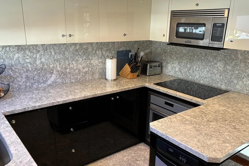 Bella Lisa Yacht Photos Pics Modern kitchen in 2020 Ocean Alexander 100 Skylounge Megayacht with sleek countertops and appliances.