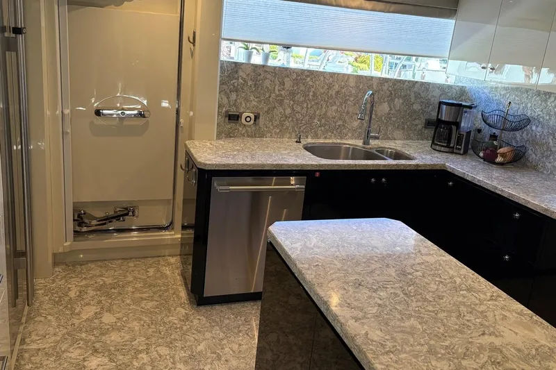 Bella Lisa Yacht Photos Pics Luxurious kitchen interior of 2020 Ocean Alexander 100 Skylounge Megayacht with marble countertops.