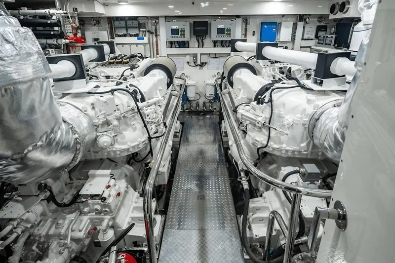 Bella Lisa Yacht Photos Pics Engine room of 2020 Ocean Alexander 100 Skylounge Megayacht, featuring advanced machinery and controls.