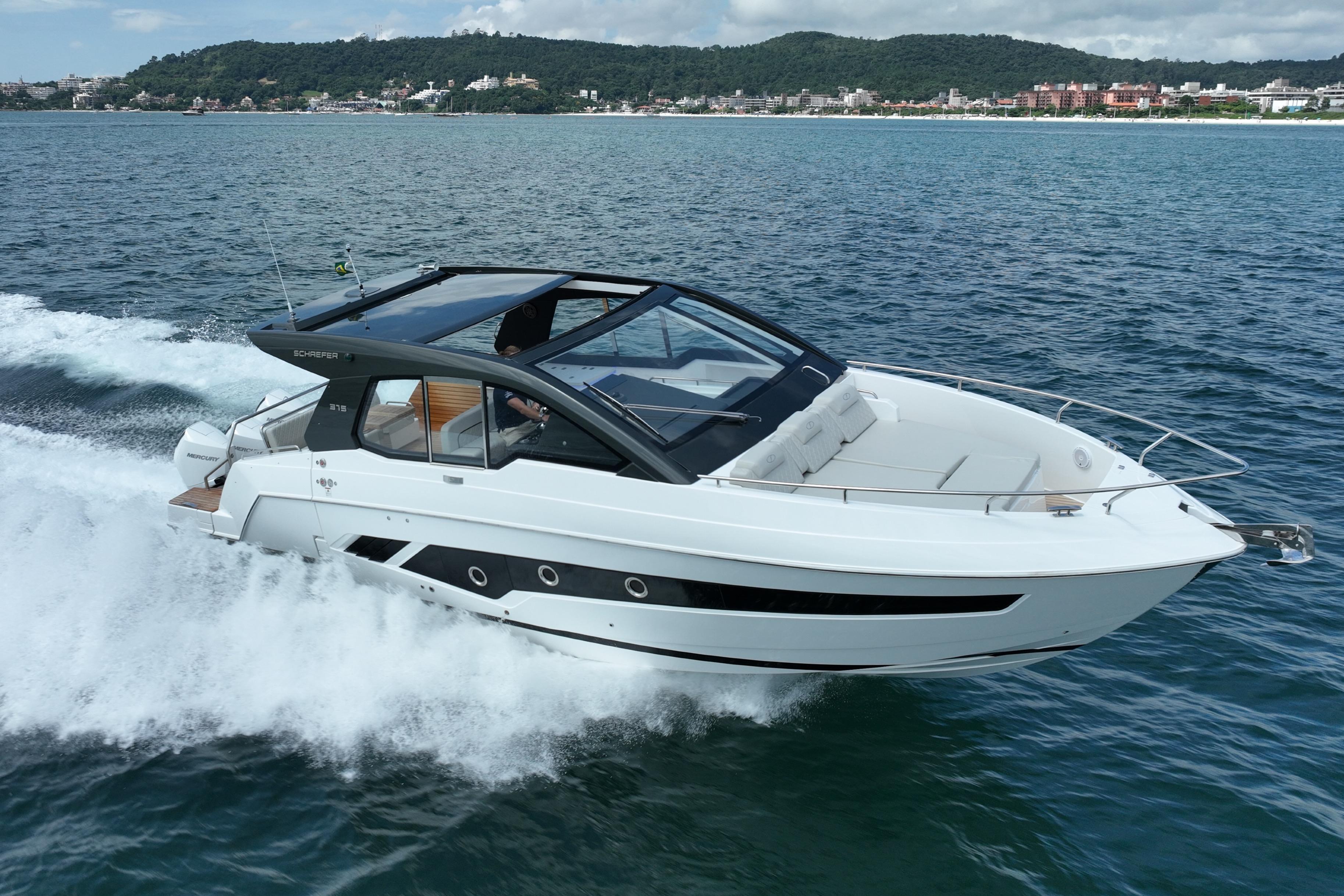 2026 Schaefer 375 yacht cruising on open water, showcasing sleek design and luxury features.