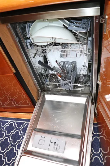  Yacht Photos Pics Dishwasher with dishes inside on Sunseeker Predator 74 yacht, 2000 model.