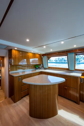 Blind Date Yacht Photos Pics Luxurious interior of 2016 Viking 46 Convertible yacht with polished wood and modern design.