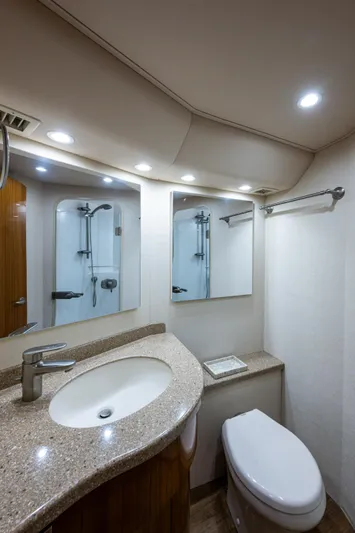 Blind Date Yacht Photos Pics Luxurious bathroom in 2016 Viking 46 Convertible yacht with modern fixtures and elegant design.