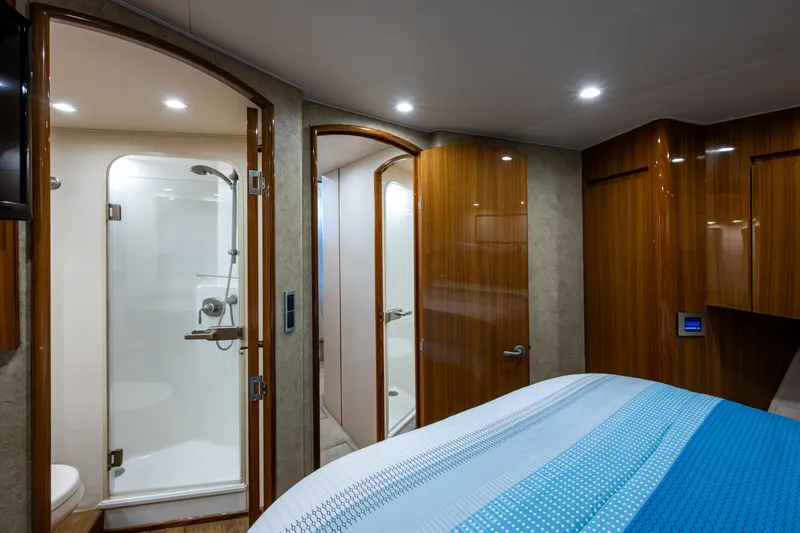 Blind Date Yacht Photos Pics Luxurious interior of 2016 Viking 46 Convertible yacht with ensuite bathroom.