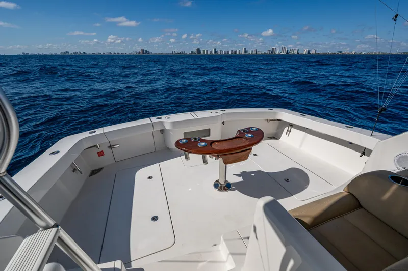 Blind Date Yacht Photos Pics Viking 46 Convertible 2016 yacht deck with ocean view and city skyline in background.