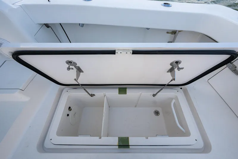 Blind Date Yacht Photos Pics Open storage compartment on a 2016 Viking 46 Convertible boat.