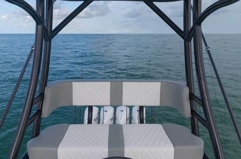  Yacht Photos Pics 2025 Regulator 41 CC boat with cushioned seating and ocean view.