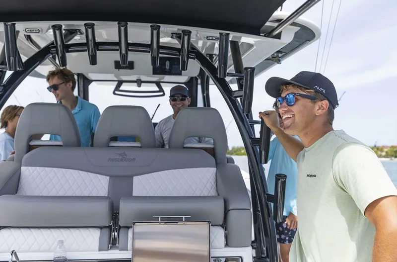  Yacht Photos Pics Group enjoying a day on the 2025 Regulator 41 CC boat.