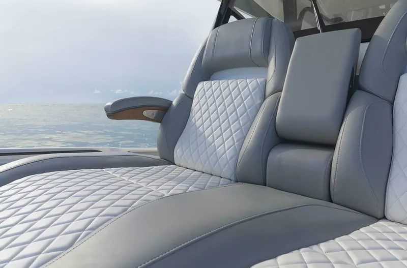 Yacht Photos Pics Luxurious seating on 2025 Regulator 41 CC boat with quilted upholstery, ocean view.