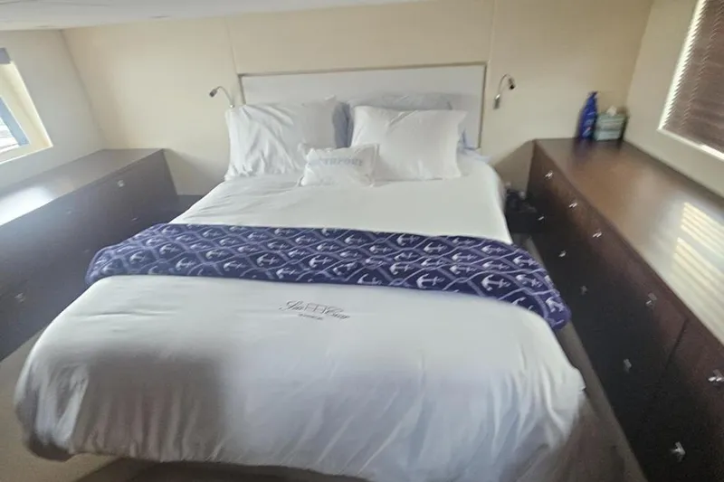 Sea Czar Yacht Photos Pics Luxurious bedroom interior of 2015 Fairline Targa 48 GT yacht with elegant bedding.