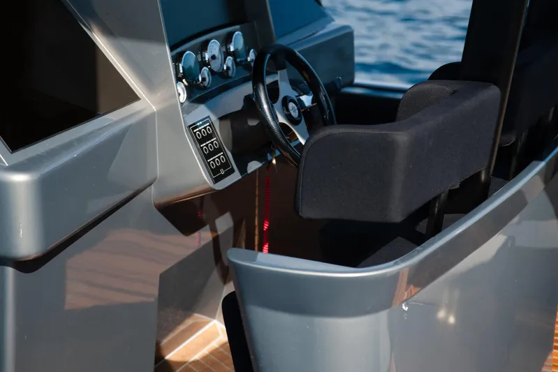 Black Shiver 100 Yacht Photos Pics Novamarine Black Shiver 100 Diesel 2025 cockpit with steering wheel and control panel.