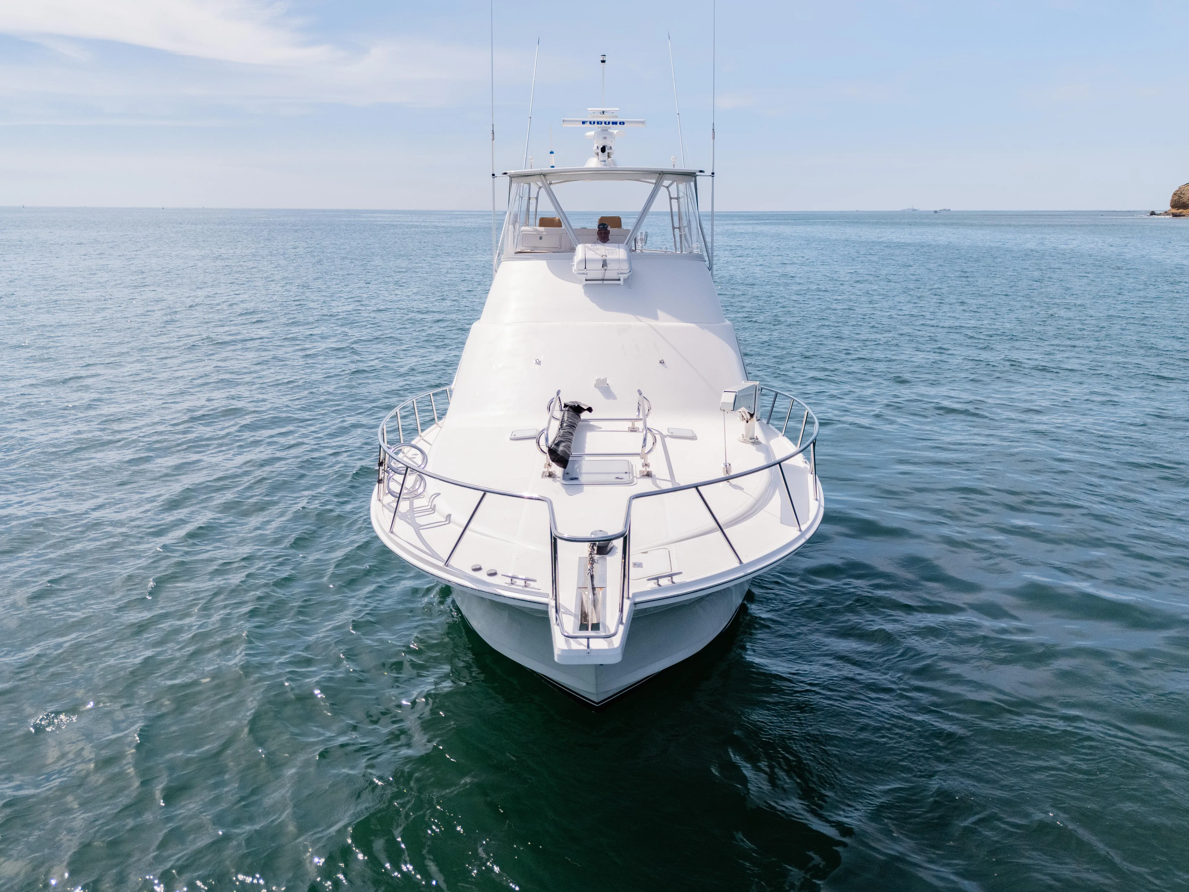Dieguito Yacht Photos Pics 2004 Cabo 48 Flybridge yacht on open water, front view.