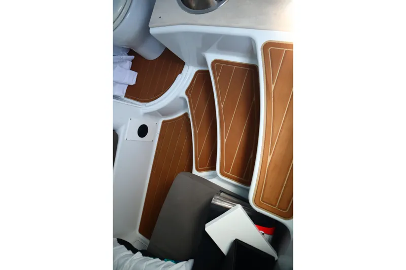  Yacht Photos Pics 2022 Yellowfin 42 Offshore interior with wooden steps and modern design.