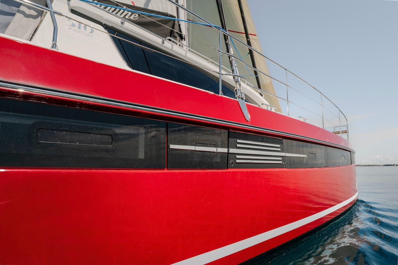 Red Privilege Signature 510 yacht from 2025 on the water.