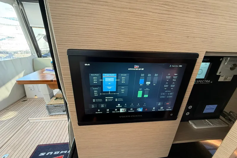Gbtt Ex Lennartz Yacht Photos Pics Control panel on 2025 Nimbus 495 Flybridge yacht, featuring advanced navigation and system displays.
