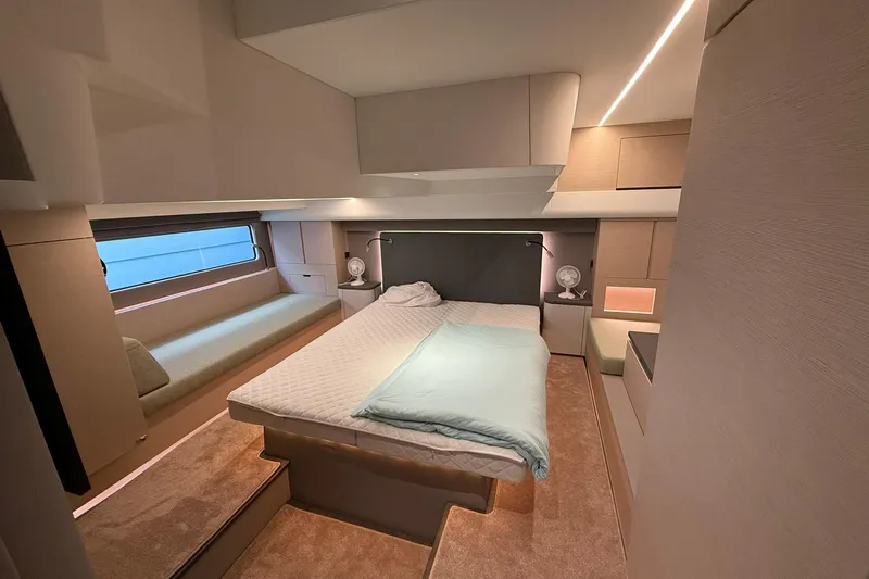 Gbtt Ex Lennartz Yacht Photos Pics Luxurious bedroom interior of 2025 Nimbus 495 Flybridge yacht with modern design.