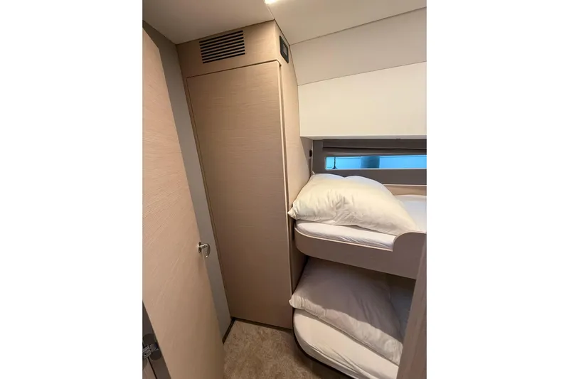 Gbtt Ex Lennartz Yacht Photos Pics 2025 Nimbus 495 Flybridge cabin with bunk beds and modern interior design.