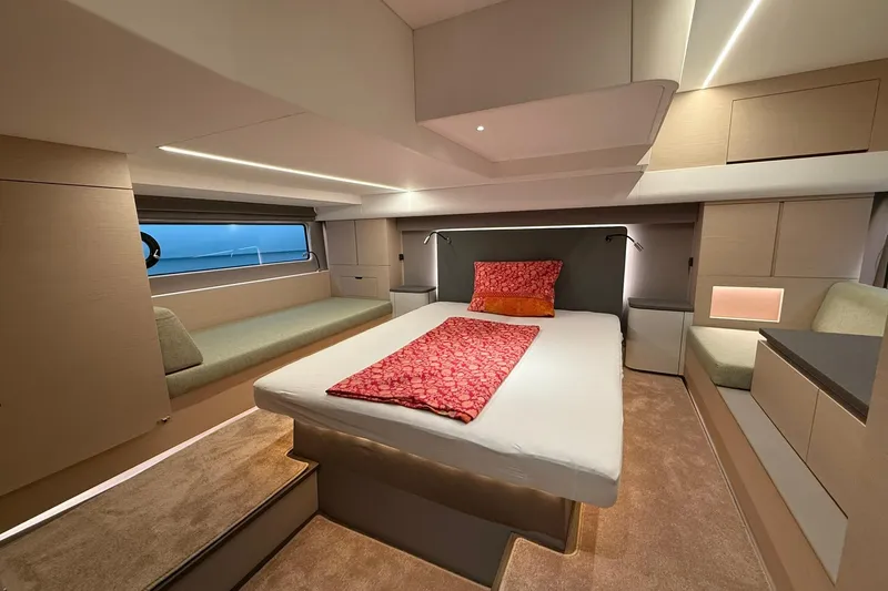 Gbtt Ex Lennartz Yacht Photos Pics Luxurious interior of 2025 Nimbus 495 Flybridge yacht with modern bedroom design.