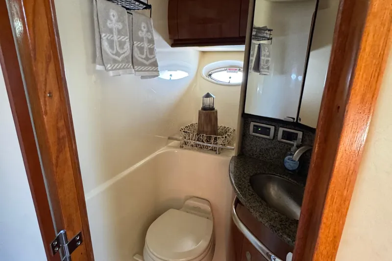 Dream Builder Yacht Photos Pics Bathroom interior of 2005 Sea Ray 420 Sundancer yacht with nautical decor.