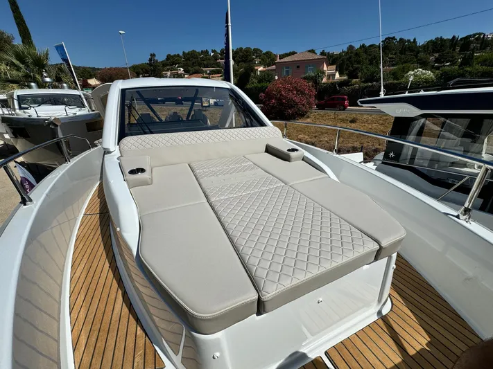  Yacht Photos Pics 2025 Jeanneau DB/37 IB yacht with luxurious deck seating and elegant design.