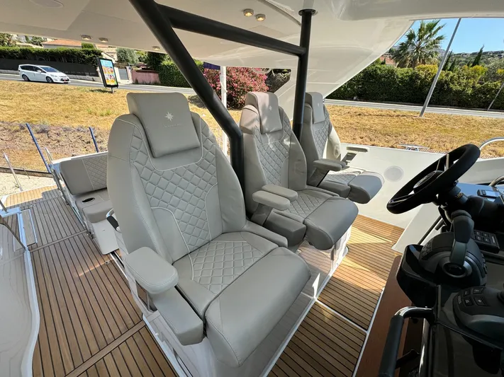  Yacht Photos Pics Luxurious seating on 2025 Jeanneau DB/37 IB boat with elegant design and premium materials.