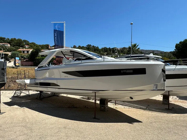  Yacht Photos Pics 2025 Jeanneau DB/37 IB yacht displayed outdoors under clear blue sky.