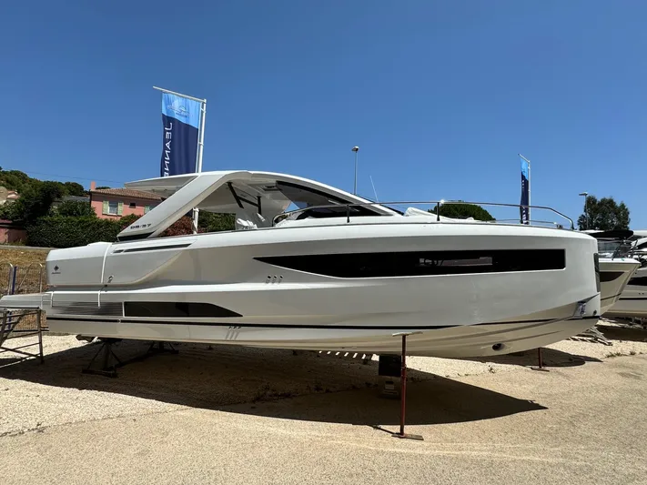  Yacht Photos Pics 2025 Jeanneau DB/37 IB yacht displayed outdoors under clear blue sky.