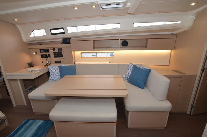 Marie Katherine Yacht Photos Pics Luxurious interior of 2022 Beneteau Oceanis 40.1 yacht with modern seating and lighting.