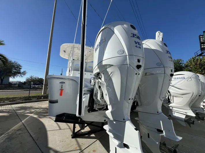  Yacht Photos Pics 2025 Regulator 30XO boat with dual Yamaha 350 V6 outboard engines, displayed outdoors.