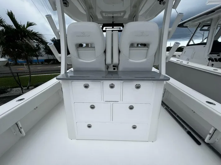  Yacht Photos Pics 2025 Regulator 30XO boat interior with dual seats and storage drawers.
