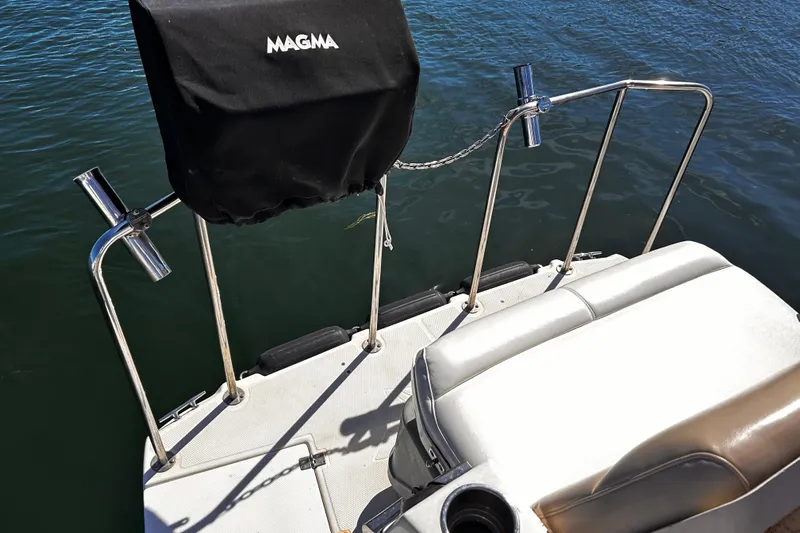  Yacht Photos Pics 2014 Cutwater C-28 boat deck with Magma grill cover and stainless steel railings.