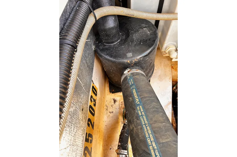  Yacht Photos Pics Engine compartment of a 2014 Cutwater C-28 boat, showing hoses and components.