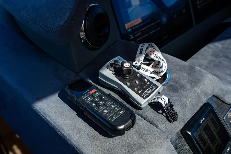 El Mar V Yacht Photos Pics Control panel and remote on a 2022 Riviera 6000SY yacht dashboard.