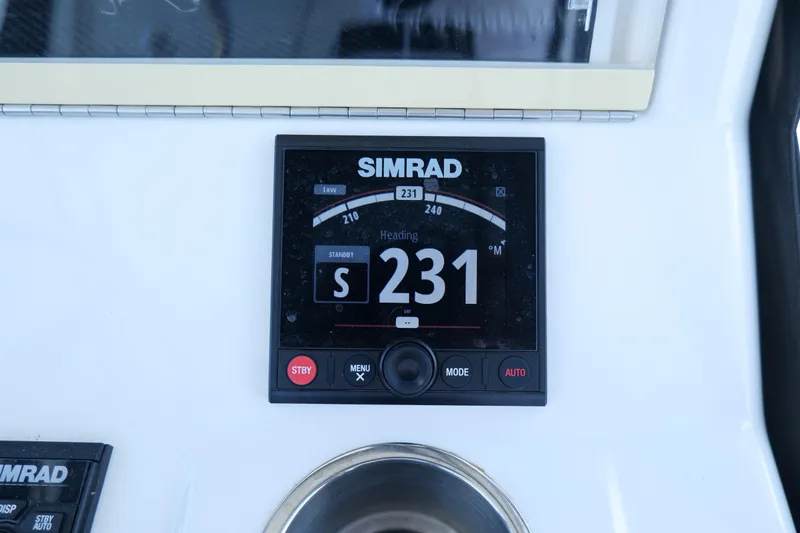  Yacht Photos Pics Simrad navigation display on 2023 SeaVee 32 boat, showing heading 231 degrees.