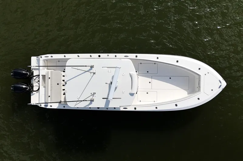  Yacht Photos Pics 2023 SeaVee 32 boat, aerial view, on water, showcasing sleek design and dual engines.