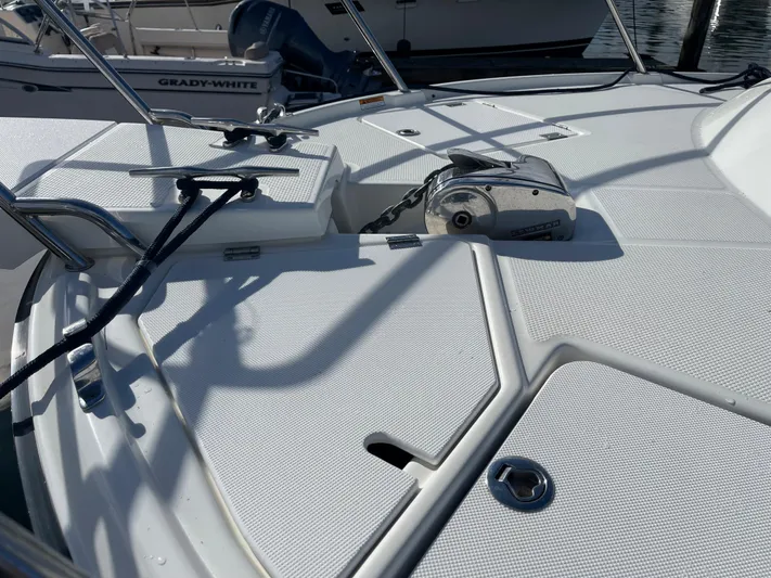  Yacht Photos Pics 2015 Cutwater 30 CB boat deck with anchor system and textured surface.