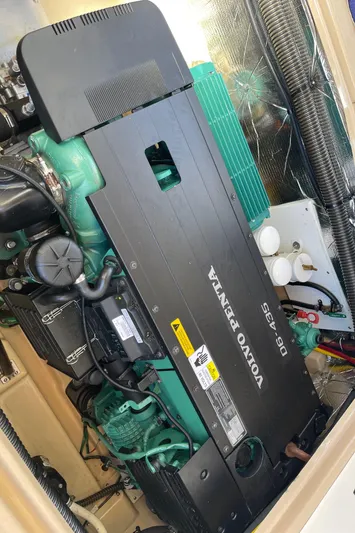  Yacht Photos Pics Volvo Penta engine in a 2015 Cutwater 30 CB boat, showcasing intricate mechanical details.