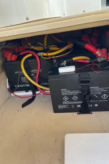  Yacht Photos Pics Battery compartment of a 2015 Cutwater 30 CB boat with wiring and connections.