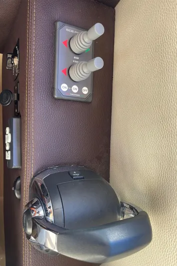  Yacht Photos Pics Close-up of 2015 Cutwater 30 CB boat controls and throttle lever.