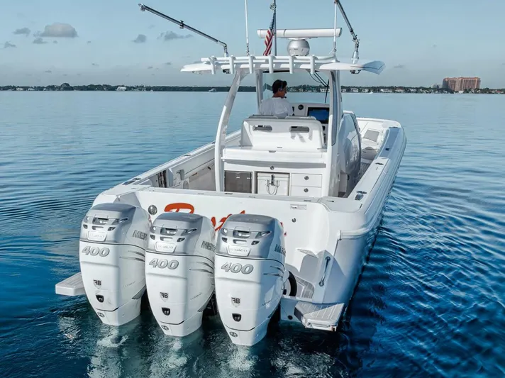  Yacht Photos Pics 2019 Intrepid 407 Panacea boat with triple Mercury 400 engines on calm water.