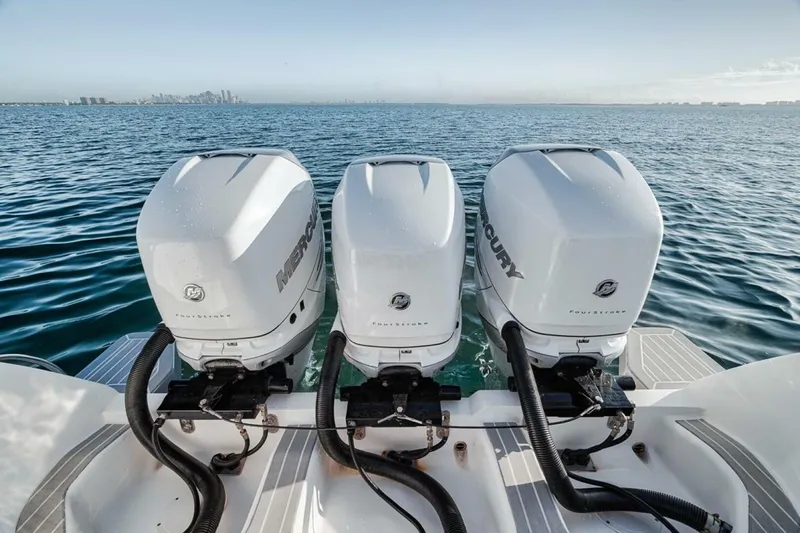  Yacht Photos Pics 2019 Intrepid 407 Panacea with triple Mercury outboard engines on open water.